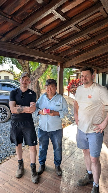 two people meeting owner of farm harvesting the coffee beans.
